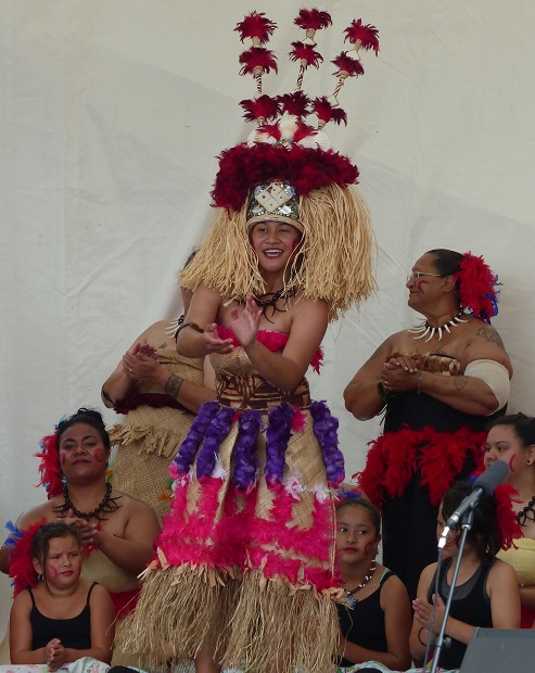 A Pacific Islander dancing in an ornate headdress a the Pasifika Fusion Festival in Whangarei